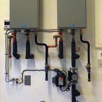 The D'MAND Kontrols® System installed directly by the water heater