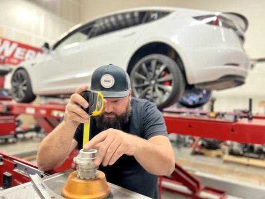 Tesla Model 3 Performance Coilover Installation, height adjustment, custom camber, and computer alignment.