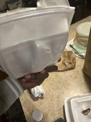 Heat from food reshaping container