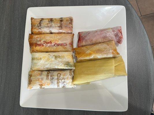 Our tamales are wrapped in labeled paper.