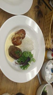 Surf and turf! Golden scallops and beef tenderloin in hollandaise sauce with short grain white rice.