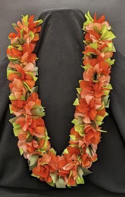 Orange daisy lei.