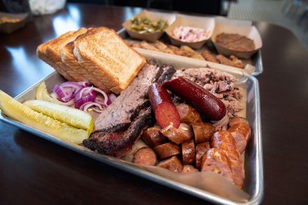 Bottom Platter - 1/2 lb. of each Sliced Brisket, Pulled Pork, Smoked Sausage, and a hot link.