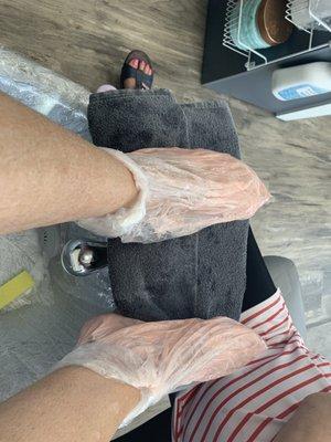 They insert your feet into a bag with warm gel in it. OMG this feels so good.