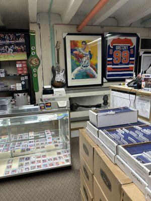 Jerseys, art and sports cards for sale.