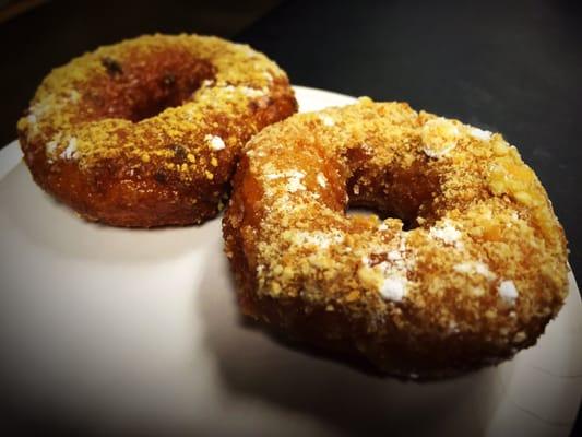 A banana cream pie donut and a blueberry shortcake donut.!