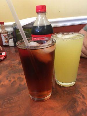 Coke, peach iced tea and pineapple drink