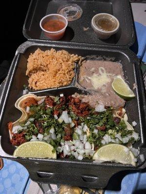 Street tacos Al pastor with rice and beans