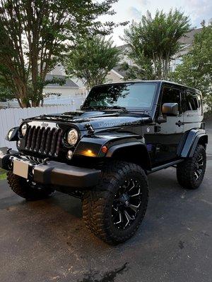 Glossy black Jeep Wrangler