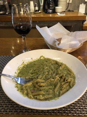 Penne with sausage and the most exciting pesto.  Paired with the best, freshest bread with fluffy interior and crusty exterior.