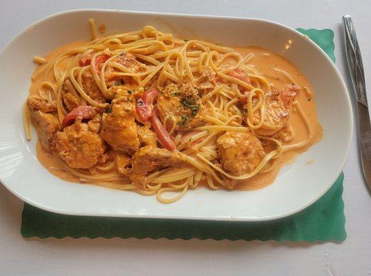 Shrimp a la Gianni over linguini