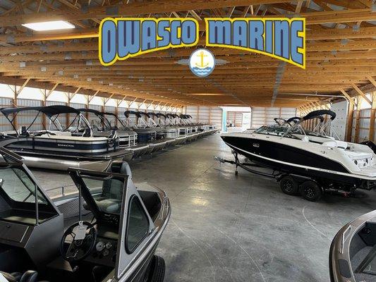 Rain or Shine you can walk-through boats at Owasco Marine's indoor showroom!