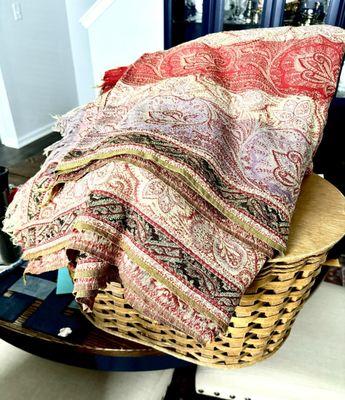 Antique paisley throw, picnic basket