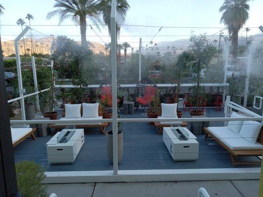 Work done by solowe at saguaro hotel .stained composite deck ,painted metal railings and painted wood that borders deck.