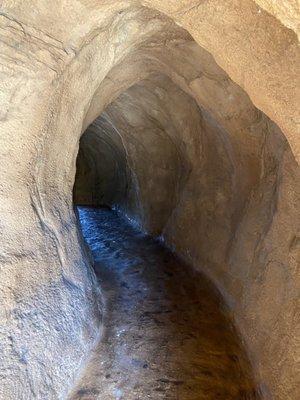 A pretty long cave you have to walk though to get to the last few holes.