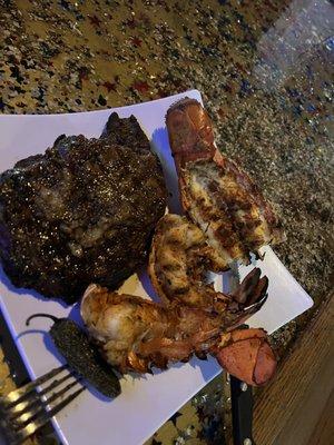 Ribeye steak lobster tails