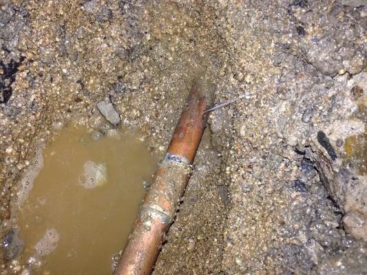 Scott Harrison Plumbing's botched direct access repair leaking 3 inches away.