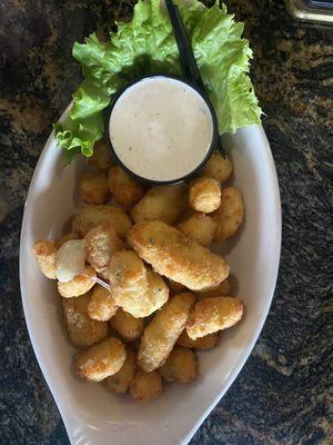 Cheese curds with homemade ranch dressing.