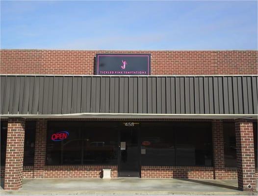 We are located in the Westbrook Shopping Center Next to Ziggys.