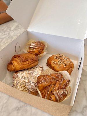 Almond croissant, Cardamom pull apart, Pain Au Chocolate, and Turkey & Cheese croissant