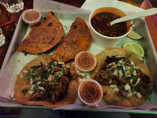 Birria tacos (top) and carnitas (bottom)