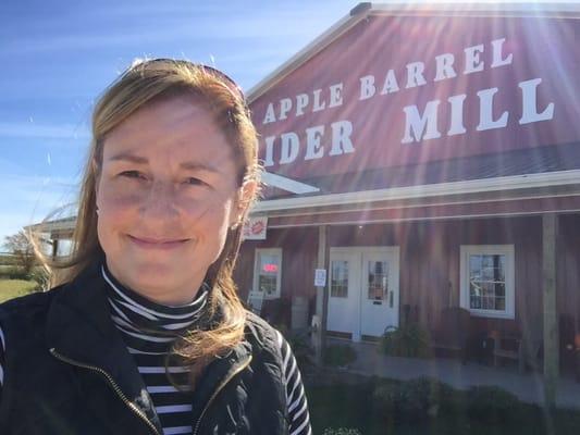 standing in front of the store