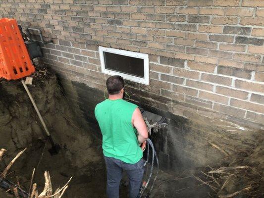 Starting a basement egress window in Essex.