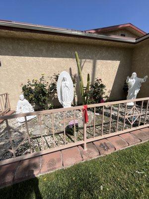 Prayer area with statues of Sacred Heart of Jesus, Blessed Mother and Juan Diego