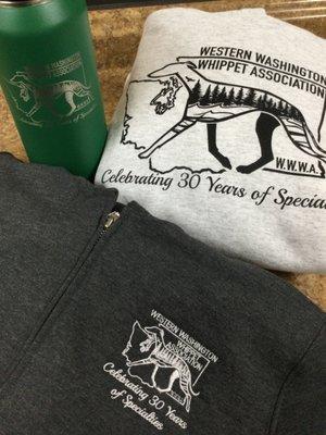 Corporate apparel and engraved tumbler for a business in Washington State.