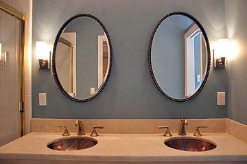 Bathroom update with Venetian plaster walls, copper sinks and new mirrors