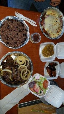 Our feast! Pechuga de pollo Uruguaya, 3 churrasco(skirt steaks), Moro, Salad, Maduros, and Tostones!