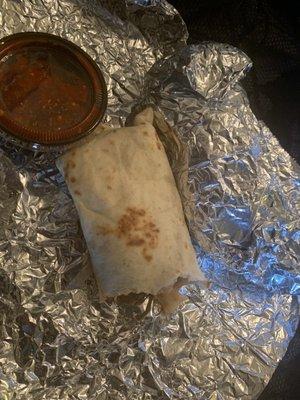 I paid $1.50 for this breakfast burrito Special Mon-Friday (Refired beans, eggs & chorizo)