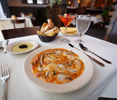 Portobello Capriccio - portobello mushrooms sauteed in our signature white wine sauce with tomatoes topped with mozzarella cheese.