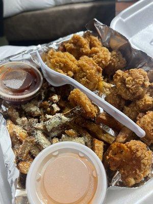 Fried shrimp platter, Buffalo blue cheese and Mambo sauces with garlic parm fries