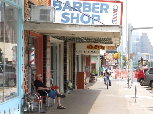 Don't Know who this guy is...but he's waiting  for his wife to return from shopping after his Avenue Barbershop trim :-)