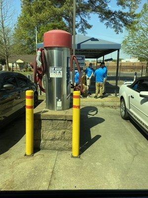 Vacuums blocked to observe social distancing but employees huddle together maskless...okay.