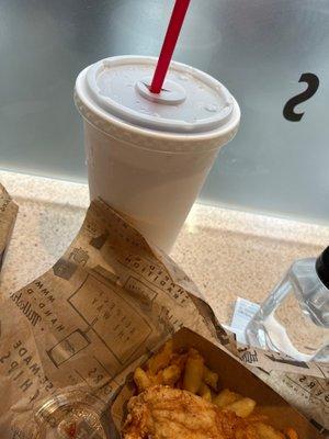 Soda, CHICKEN TENDERS and fries