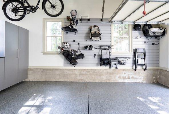 Garage cabinets, garage flooring, garage storage and handball.