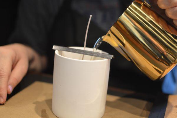 Pouring the wax for a crystal candle