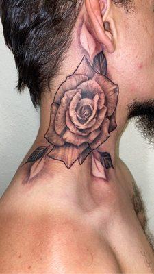 Rose tattoo neck tattoo