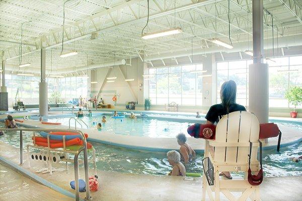 Aquatic area with river walk, lap lanes, hot tub and central pool accommodates fitness classes, therapeutic programs & swim lessons.