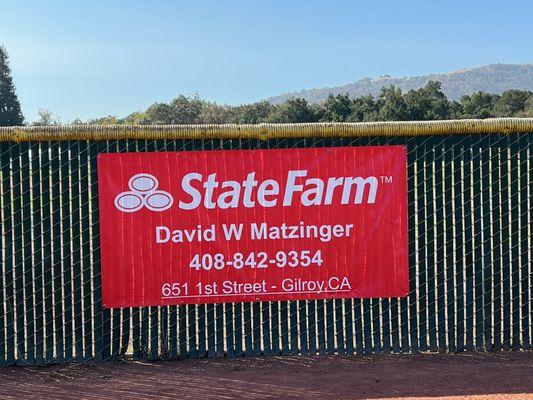 Banner supporting local Gilroy school sporting program.