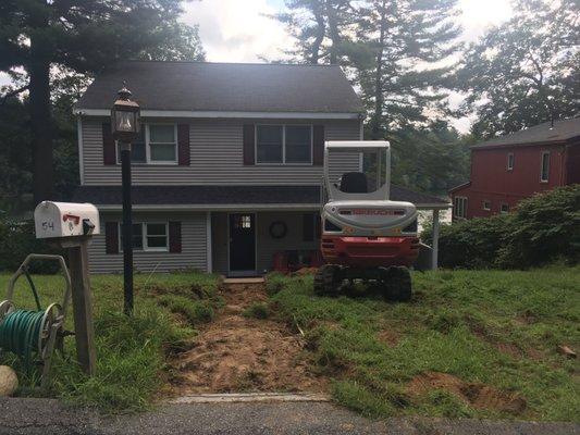 Original straight walkway and front yard - street to house.