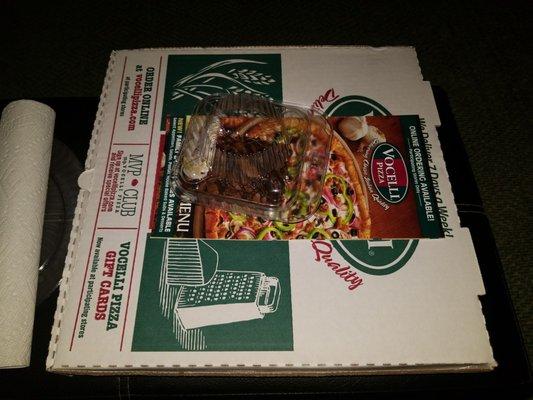 $14.99 special large 3 topping pizza with a brownie.