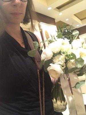 So this happened - me carrying the 3-day old bouquet in the vase as we are leaving the hotel for the airport.