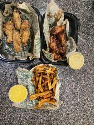 Hickory Smoked BBQ and Garlic Parmesan  Cheese in cup by French fries