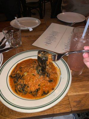 Squid ink pasta with seafood, paloma for drink