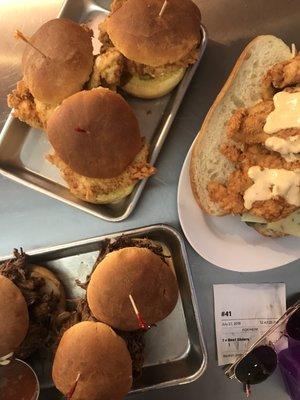 An array of yummies from Chef Brian's! BBQ beef sliders, fried chicken sliders, Saturday sandwich.