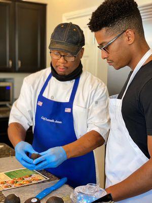 Armani learning from Chef Kenneth --- How to tame an #Avocado!! Lol!