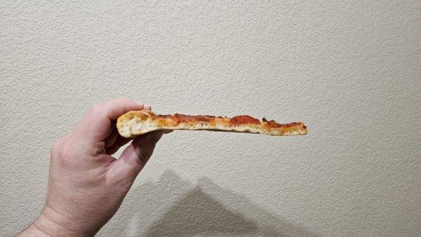 A piece of pepperoni pizza from Little Caesars. Right out of the box, less than 10 minutes from picking it up at the store.